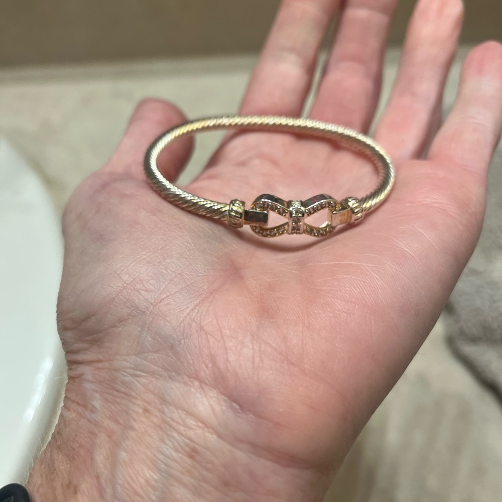 Goldtone cable bracelet bangle with rhinestone accents
